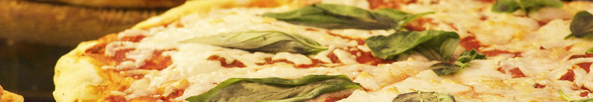 Eating Pizza at Pizzeria Mariana restaurant in Newark, DE.